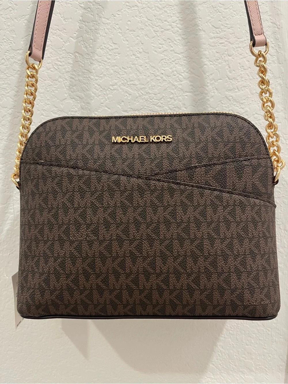Michael Kors Brown Monogram Crossbody with Pink Trim and Gold Chain Brand new .